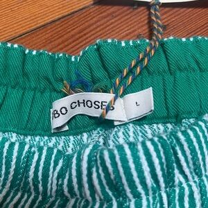 Bobo Choses Women's striped twill cocoon pants green and white. Made in Spain